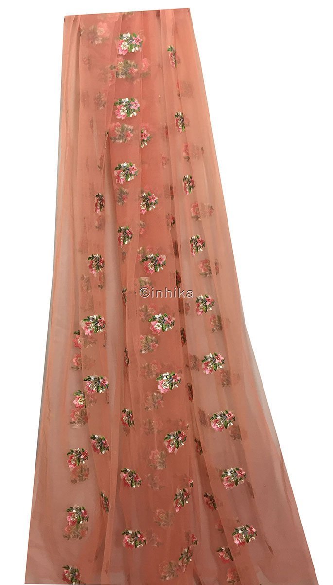 embroidered peach material