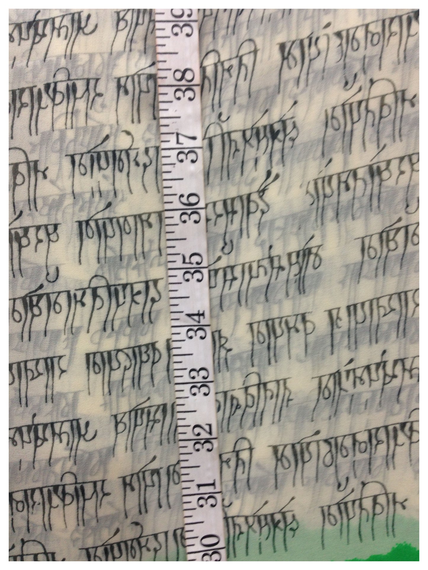 White Green Alphabet Print Georgette Fabric