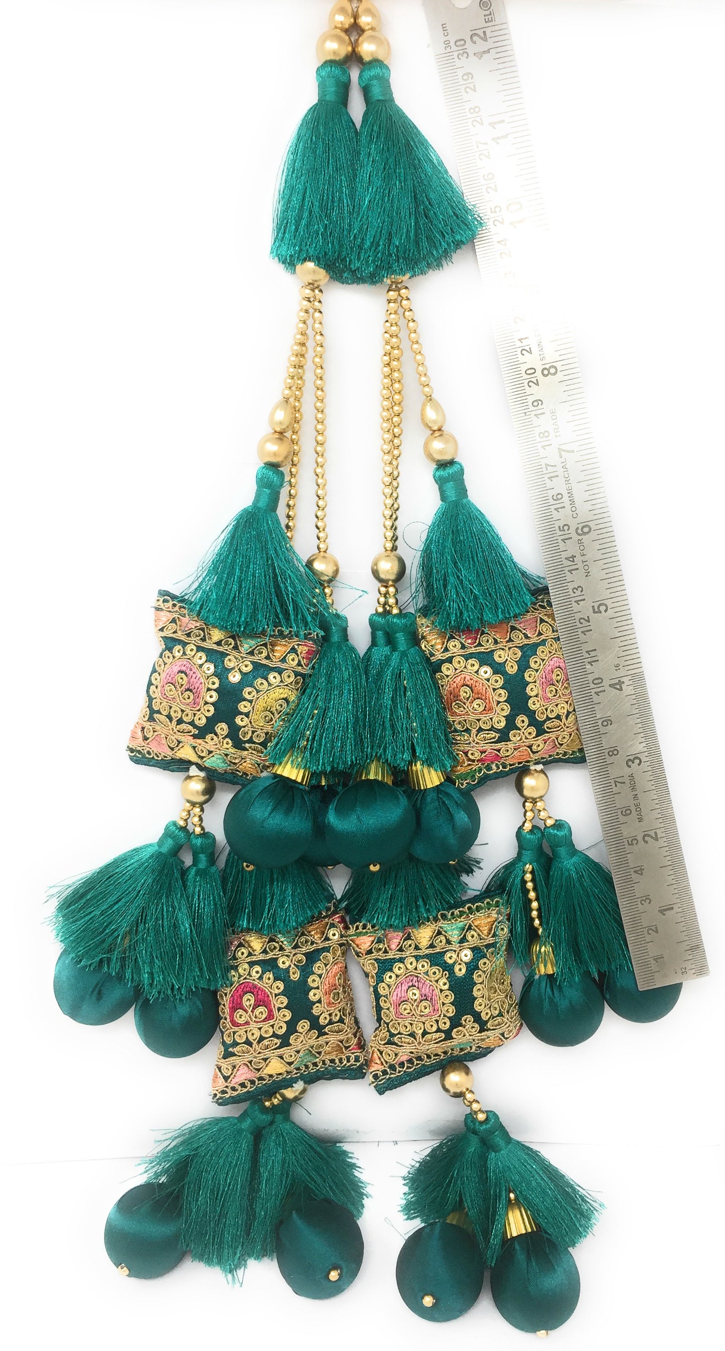 Beautiful Multicoloured lehenga latkan with funky embroidery and cute pom poms